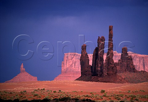 Totem Pole and YeiBiChei with Meridian   Butte and Rooster Rock beyond  Monument Valley Arizona USA