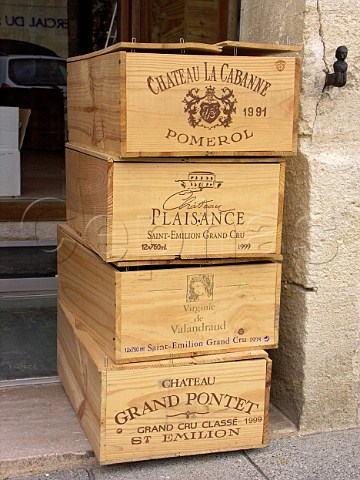 Empty wooden wine cases in a shop doorway   Stmilion Gironde France Stmilion  Bordeaux