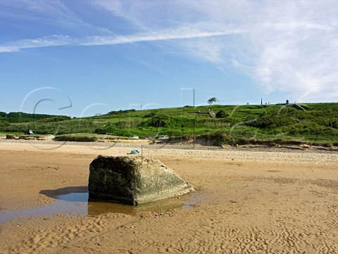 Remnants of a concrete obstacle on Omaha Beach   CollevillesurMer Calvados France   BasseNormandie