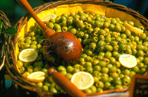 Stall selling green olives in the market   at IlesurlaSorgue Vaucluse France