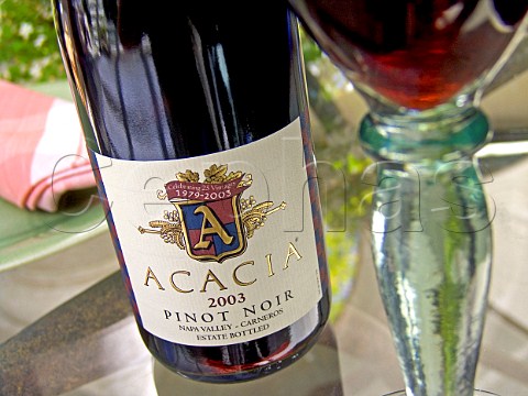 Bottle and glass of Acacia 2003 Carneros Pinot Noir