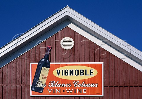 Sign on gable of Vignoble Les Blancs Coteaux winery Dunham Qubec Canada