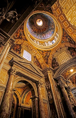 Ornate gilded interior of St Peters Basilica   Vatican City Rome Italy