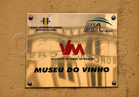 Plaque outside the Instituto do Vinho da Madeira   with reflection of H M Borge wine lodge Funchal   Madeira Portugal