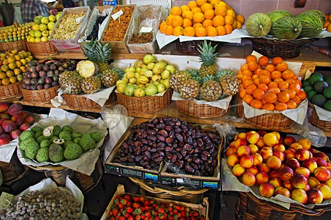 Display of fruit and vegetables on a market stall at   the Mercado dos Lavradores Funchal Madeira   Portugal
