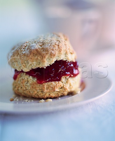 Wholemeal scone with strawberry jam