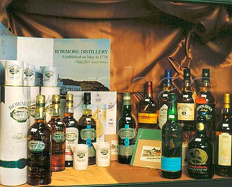 Display of Islay and Jura whiskies in The Whisky   Shop Dufftown Banffshire Scotland Speyside