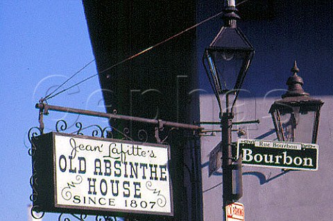 Signs for Jean Lafittes   Old Absinthe House and Bourbon Street   New Orleans Louisiana USA