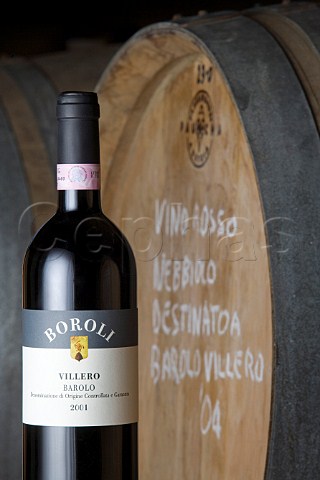 Bottle and barrel of Villero Barolo in cellar of   Vini Boroli Madonna di Como near Alba Piemonte   Italy