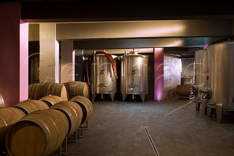Stainless steel fermentation tanks and barrels in winery of Giacomo Borgogno Barolo Piedmont Italy  Barolo