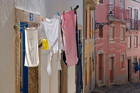 Washing hanging in narrow street Alfama Old   Lisbon Portugal