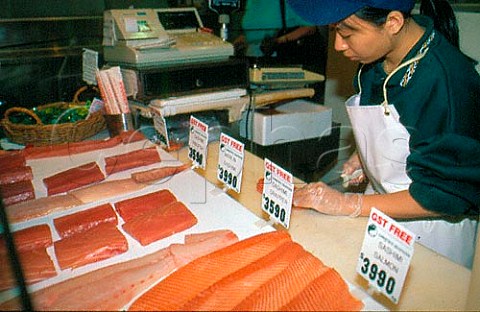 Preparing sashimi Peters fish market  Darling Harbour Sydney Australia