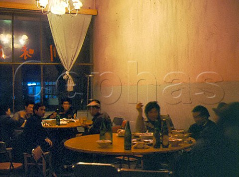 Men in restaurant Turfan Xinjiang Province China
