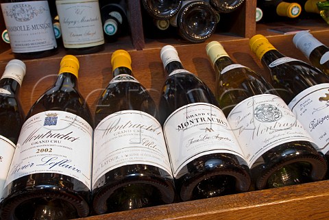 Selection of Grand Cru Montrachet bottles on display   in JeanLuc Aegerter wine shop Rue Carnot Beaune   Cte dOr France