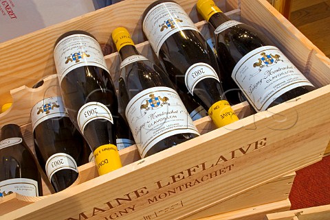 Open wooden case of Domaine Leflaive PulignyMontrachet Clavoillon 2003 wine on display in JeanLuc Aegerter wine shop Beaune Cte dOr France