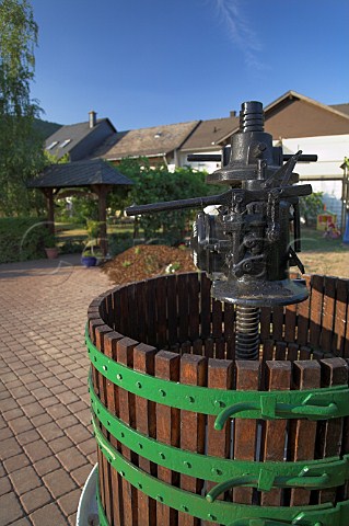 Decorative wine press advertising tastings outside a   small Winery in Piesport Mosel