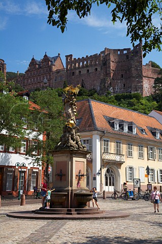 Statue of Madonna and Child in the Kornmarkt with   Heidelberg castle beyond  Heidelberg   BadenWrttemberg Germany