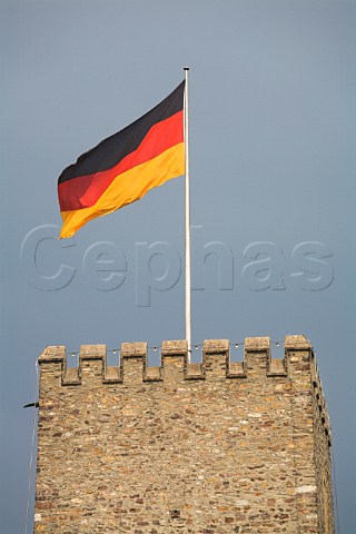 German flag flying on castle ruins Rdesheim   Rheingau Germany