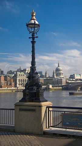 Ornate lamppost at Gabriels Wharf with Saint Pauls Cathedral in the distance London