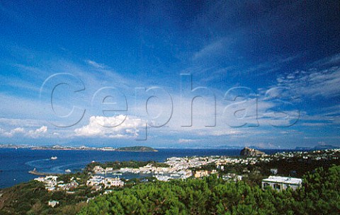 Harbour at Ischia with the Isle of   Prcida beyond and Mount Vesuvius in the   distance Campania Italy