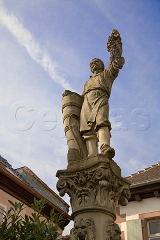 Statue of grape picker in Ribeauvill HautRhin   France  Alsace
