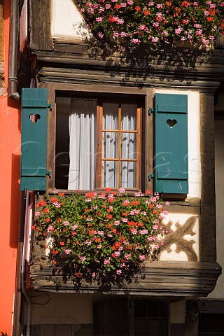 Shuttered window with flowerbox  Kaysersberg   HautRhin France  Alsace