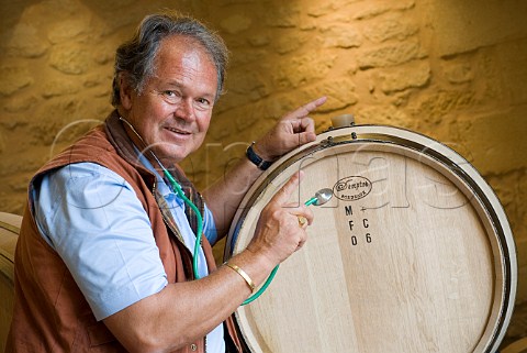Doctor Alain Raynaud with barrel of his 2006   Chteau Quinault LEnclos Libourne Gironde France   Saintmilion  Bordeaux
