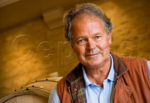 Doctor Alain Raynaud in barrel cellar of Chteau   Quinault LEnclos Libourne Gironde France    Saintmilion  Bordeaux