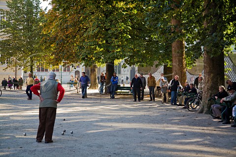 Playing boules in the centre of Bruges Belgium