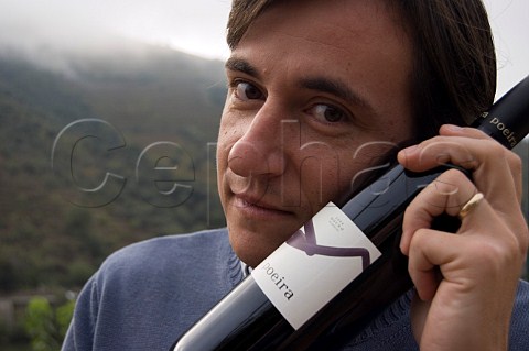 Jorge Moreira winemaker with bottle of his own label table wine Poeira Douro Valley Portugal Douro