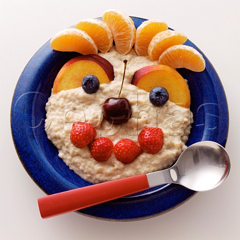 Porridge with fresh fruit made into a funny face