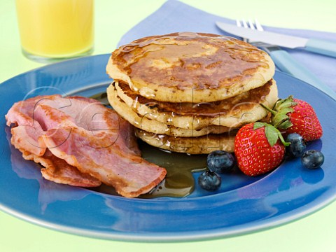American pancakes with bacon and maple syrup