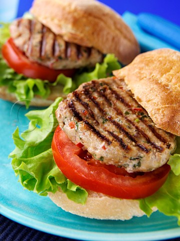 Chicken burgers with salad in rolls