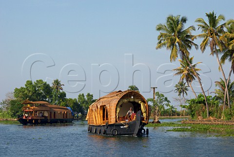 Houseboats on the Kuttanad the backwaters of Kerala known as the Venice of the East Kerala India