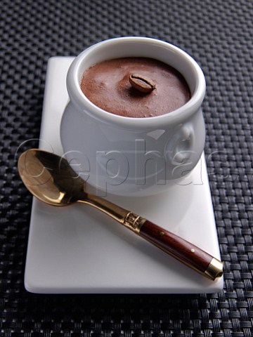 Chocolate mousse with coffee beans on top
