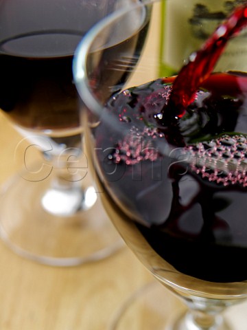 Pouring Bordeaux wine