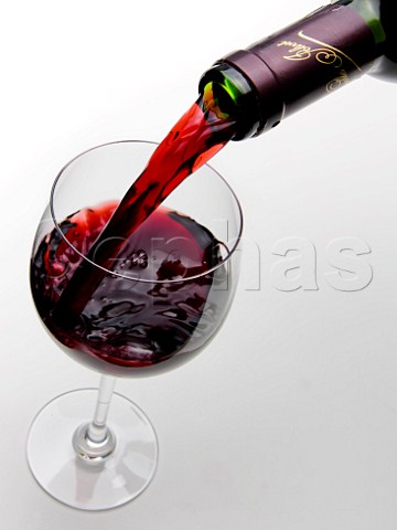 Pouring Bordeaux wine