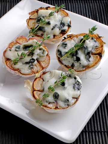 Roasted garlic with Roquefort and rosemary topping