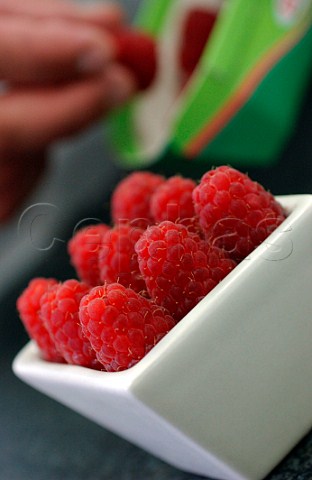 Arrangement of raspberries in dish