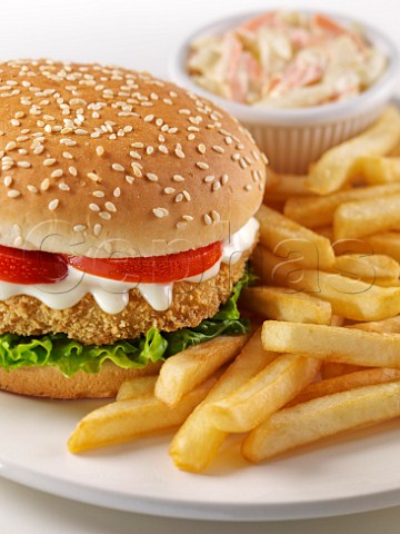 Chicken burger with salad chips and coleslaw