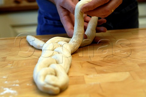 Braiding a bread plait
