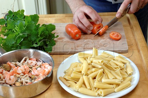 Preparing ingredients for a seafood pasta