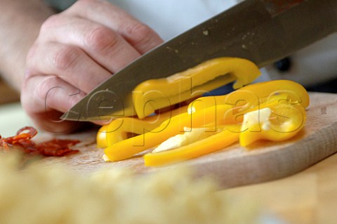 Slicing a yellow pepper