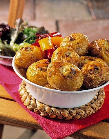 Bowl of stuffed potatoes on a table