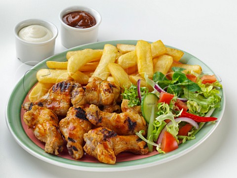 Cephas Picture Library - Asset Details 1211647- Chicken wings and chips.