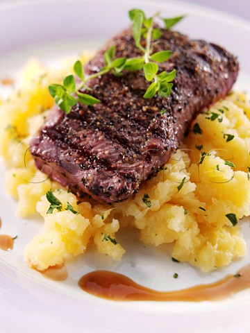 Venison steak with mashed swede