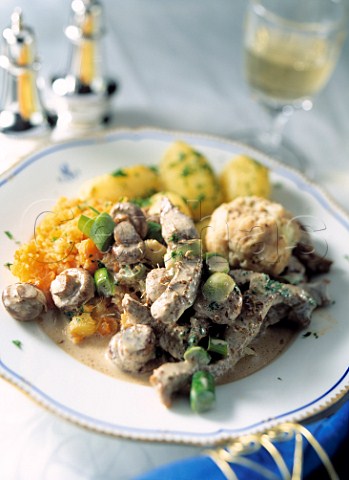 Beef stroganoff with mashed swede mushrooms and boiled potatoes