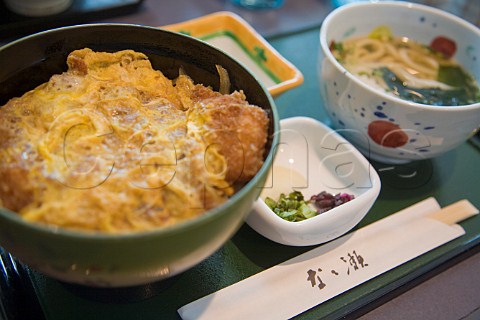 Japanese Katsudon Breadcrumbed pork cutlet on a bed of rice with an egg topping