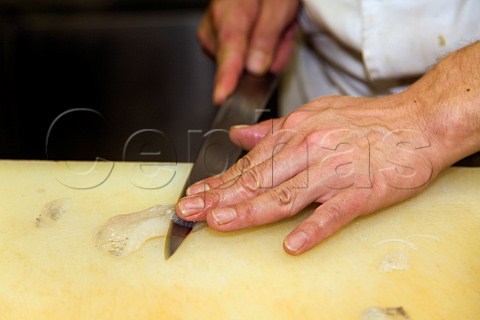 Slicing a dab for sashimi in a Japanese restaurant