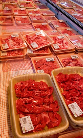 Thinly sliced beef on sale in a Japanese supermarket Australian lean red meat in the foreground Japanese paler marbled beef behind